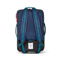 General shot of backpack straps on Topo Designs Global Travel Bag Roller durable carry-on convertible laptop rolling suitcase in Navy blue.
