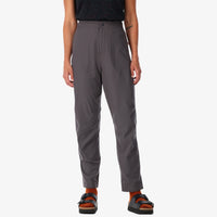 Topo Designs Women's Lightweight Tech Pants in "charcoal" gray on model front.