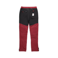 General back shot of Topo Designs Women's Fleece Pants in "Burgundy / Black"