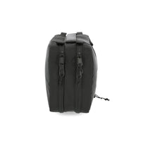 General side shot of Topo Designs Tech electronics organization travel Case in black recycled nylon.