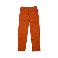 Front product shot of Topo Designs Women's Lightweight Tech Pants in "Brick" orange.